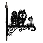 Keeshond metal hanging basket bracket mounted on outdoor wall for plant decoration