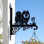 Keeshond metal hanging basket bracket mounted on outdoor wall for plant decoration