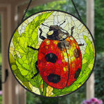 Ladybug on green leaves stained glass suncatcher window hanging, suitable for home and garden decoration