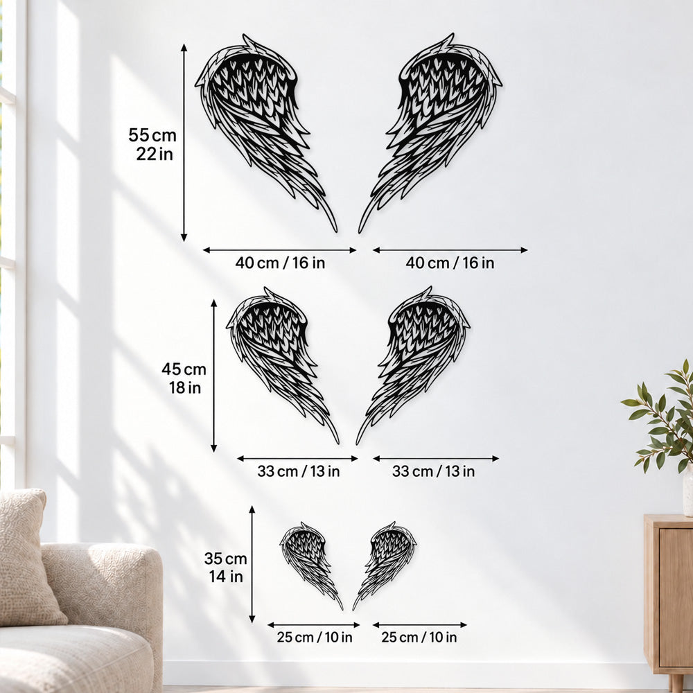 Black metal Layered Angel Wings wall art with intricate cutout details displayed on the wall