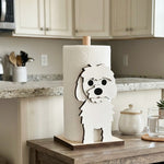 Maltese Wooden Dog Paper Towel Holder displayed on a kitchen countertop with a freestanding paper towel roll