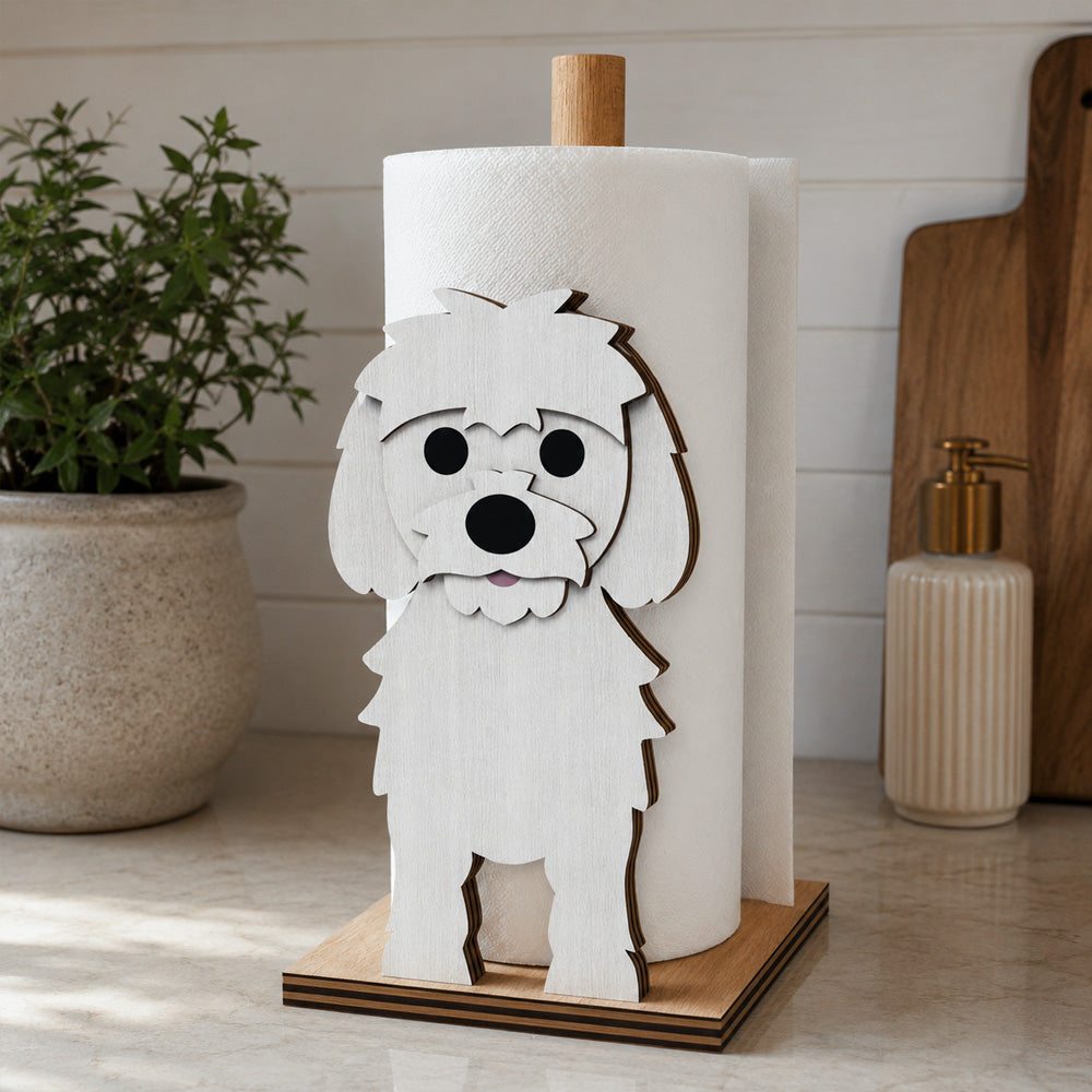 Maltese Wooden Dog Paper Towel Holder displayed on a kitchen countertop with a freestanding paper towel roll