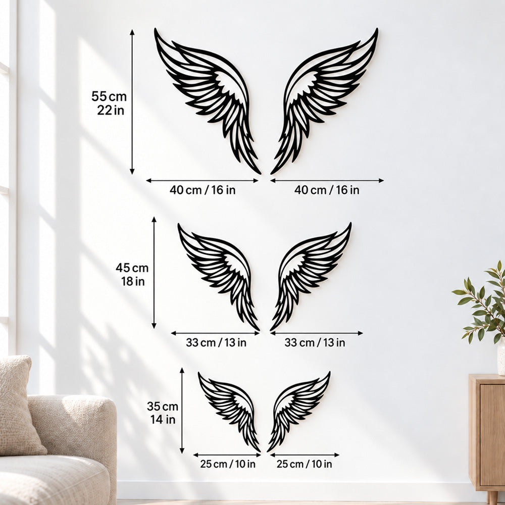 Black metal Butterfly wings wall art with intricate cutout details displayed on the wall