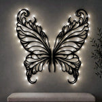 Black metal Elegant Butterfly wings wall art with Soft White LED Lighting displayed on the wall