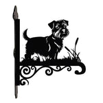 Norfolk terrier metal hanging basket bracket mounted on outdoor wall for plant decoration