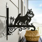 Norwich terrier metal hanging basket bracket mounted on outdoor wall for plant decoration