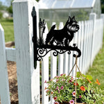 Norwich terrier metal hanging basket bracket mounted on outdoor wall for plant decoration