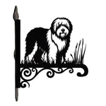 Old english sheepdog metal hanging basket bracket mounted on outdoor wall for plant decoration