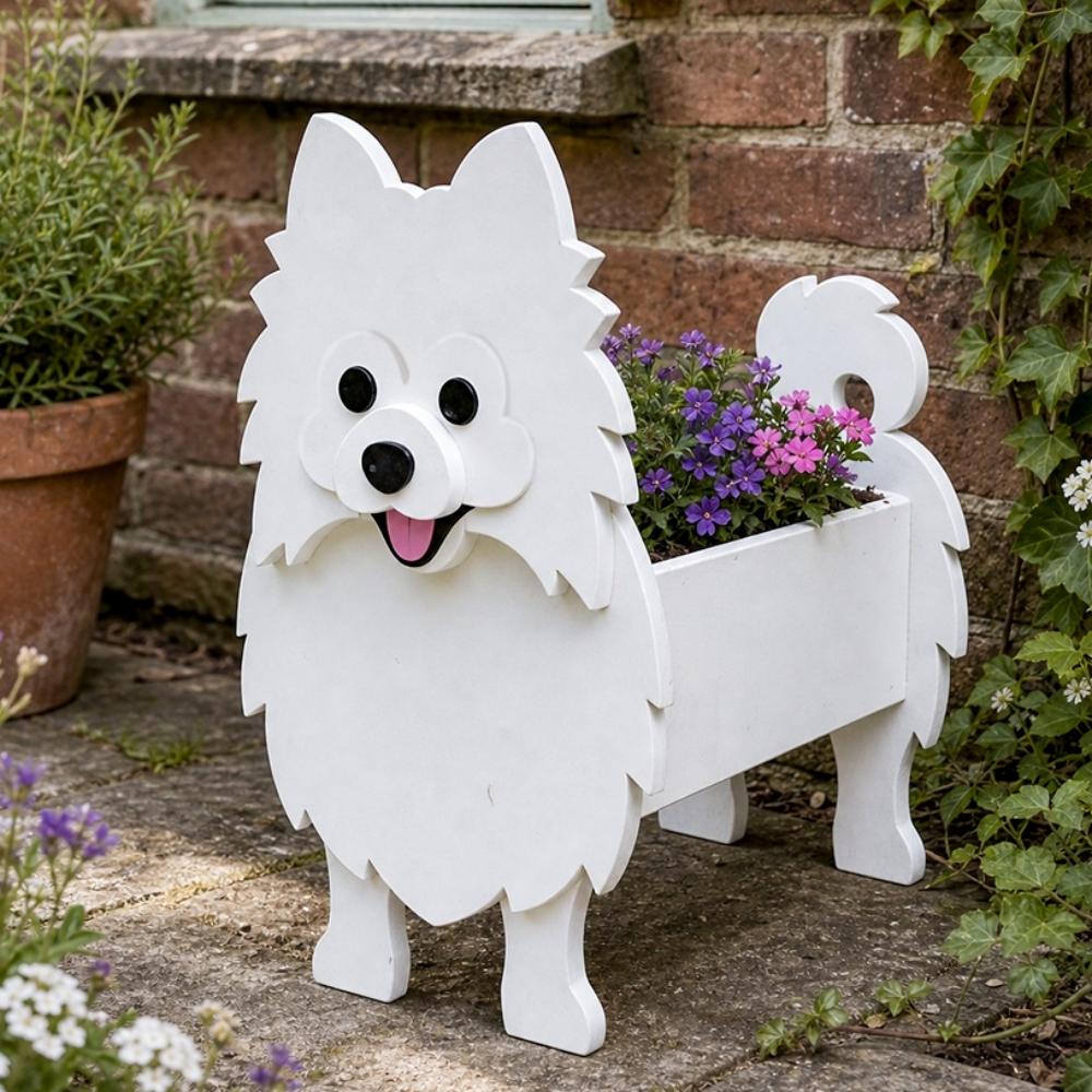 Pomeranian dog planter filled with fresh flowers is placed in the garden