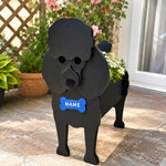 Poodle dog planter filled with fresh flowers is placed in the garden