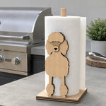 Poodle Wooden Dog Paper Towel Holder displayed on a kitchen countertop with a freestanding paper towel roll