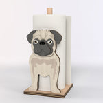 Pug Wooden Dog Paper Towel Holder displayed on a kitchen countertop with a freestanding paper towel roll