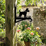 Puppy with flowers metal hanging basket bracket mounted on outdoor wall for plant decoration