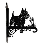 Scottish terrier metal hanging basket bracket mounted on outdoor wall for plant decoration