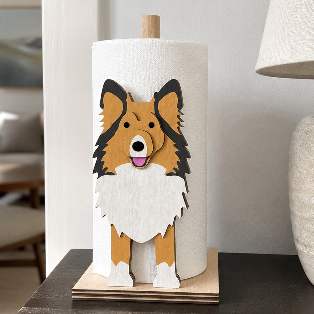 Shetland Sheepdog Wooden Dog Paper Towel Holder displayed on a kitchen countertop with a freestanding paper towel roll
