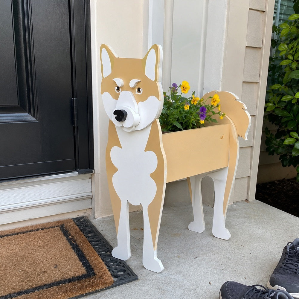 Shiba Inu dog planter filled with fresh flowers is placed in the garden