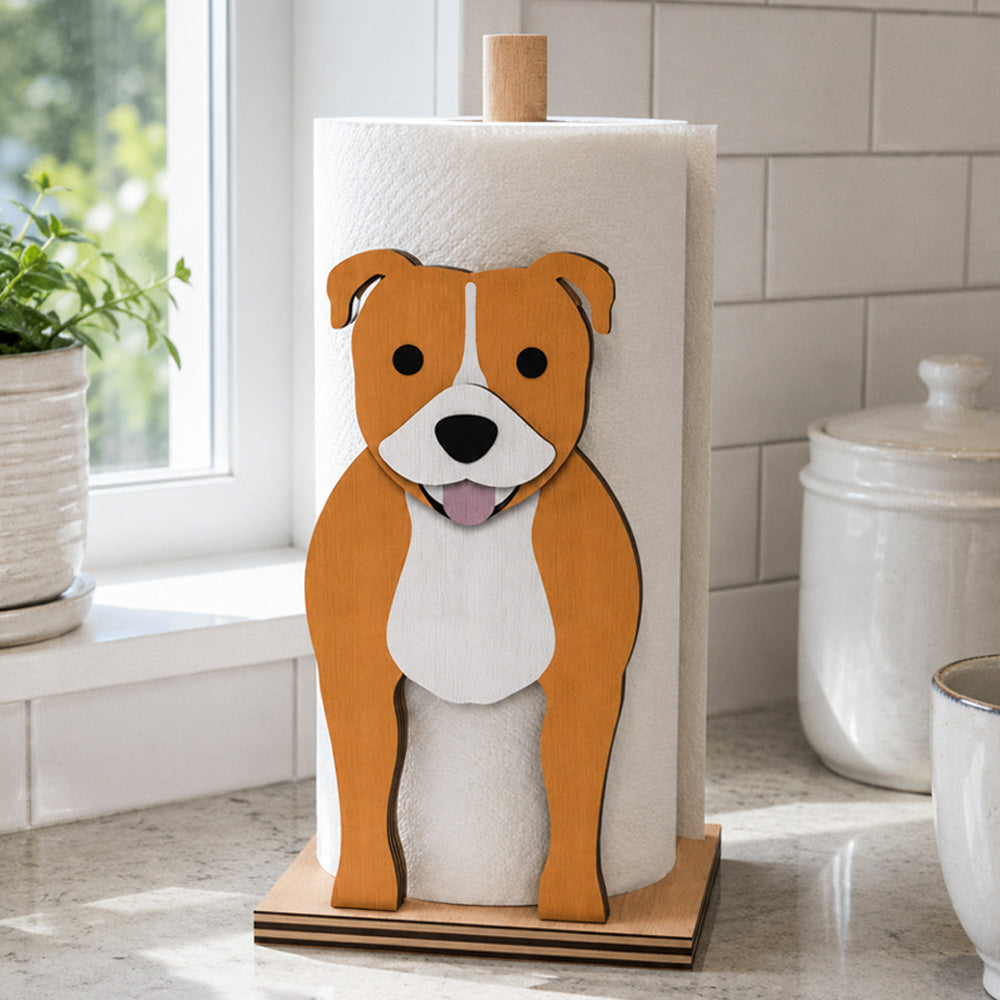 Staffordshire Bull Terrier Wooden Dog Paper Towel Holder displayed on a kitchen countertop with a freestanding paper towel roll