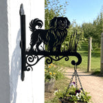 Tibetan spaniel metal hanging basket bracket mounted on outdoor wall for plant decoration