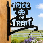 Trick or treat pumpkin metal hanging basket bracket mounted on outdoor wall for plant decoration