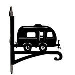 Vintage camper metal hanging basket bracket mounted on outdoor wall for plant decoration