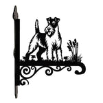 Wire fox terrier metal hanging basket bracket mounted on outdoor wall for plant decoration