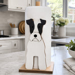 Wire Fox Terrier Wooden Dog Paper Towel Holder displayed on a kitchen countertop with a freestanding paper towel roll